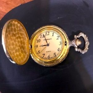 Black & gold pocket watch